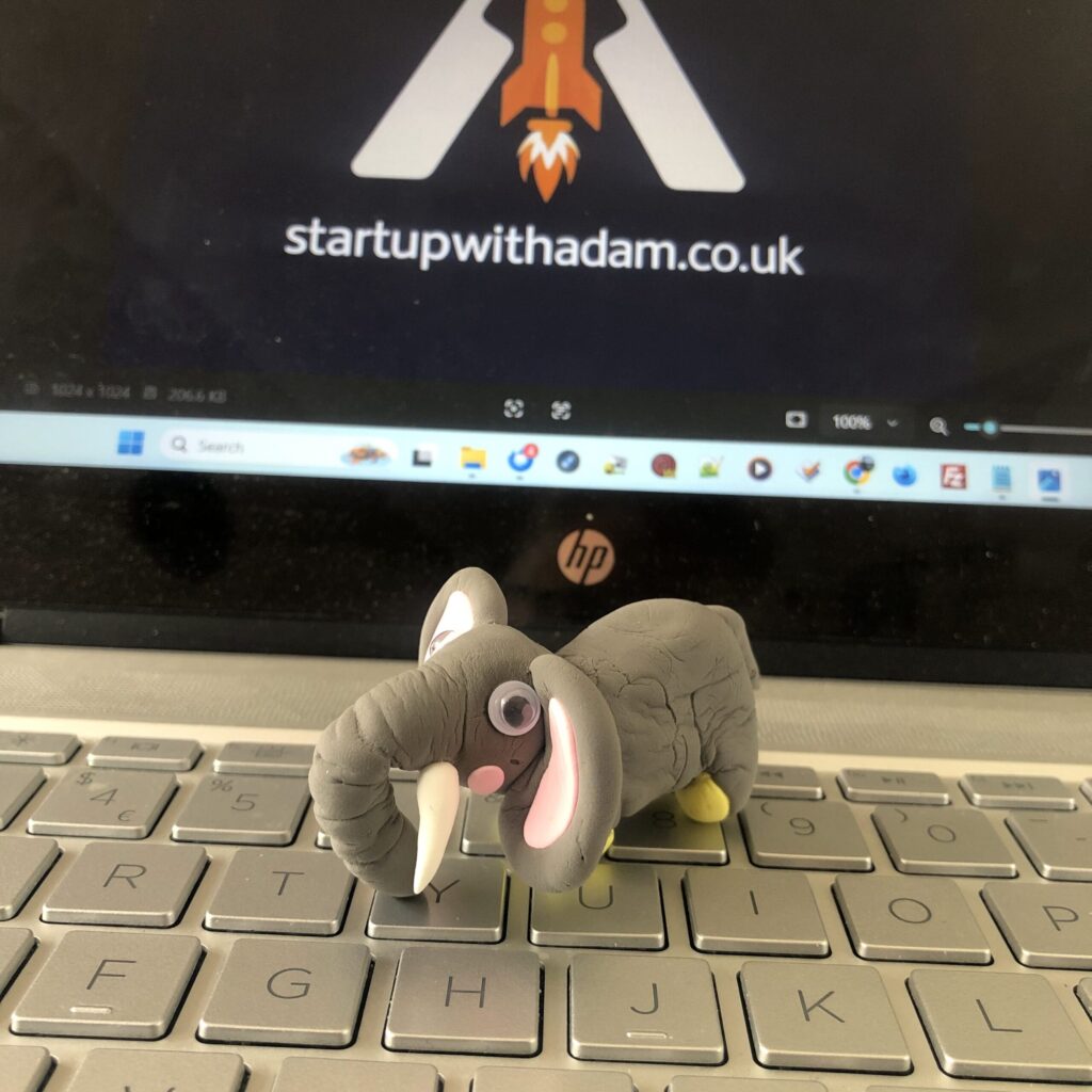 air drying clay elephant on keyboard